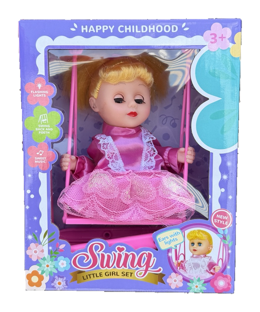 Blonde doll in pink dress seated on a pink toy swing in its retail box